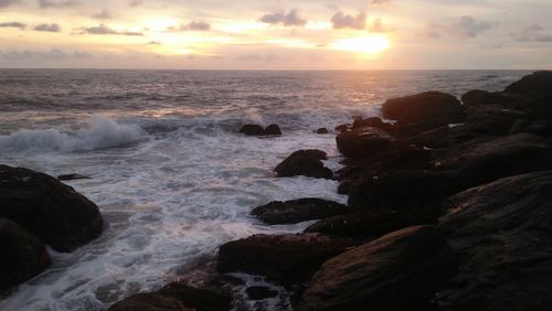 Scenic view of sea against sky during sunset