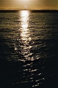 Abstract image of sea against sky during sunset