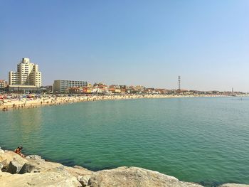 View of cityscape against clear sky