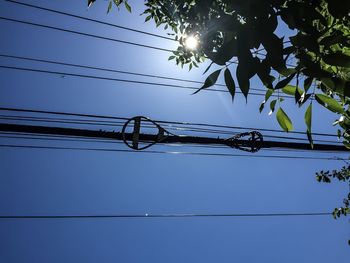 Low angle view of electricity pylon