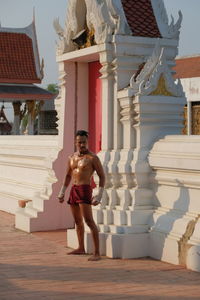 Shirtless man at temple