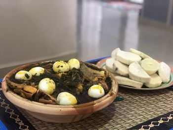 Close-up of fruits in plate on table