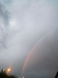 Low angle view of rainbow against sky