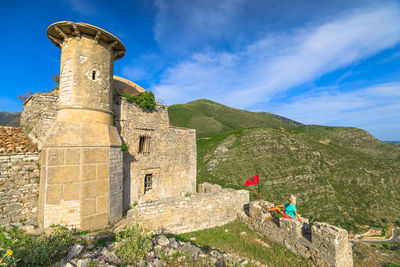 Low angle view of old ruins against sky