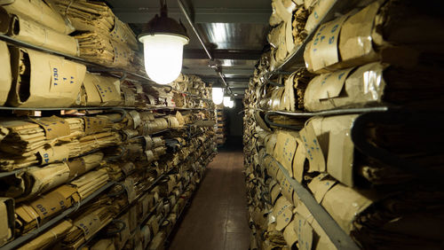 Panoramic shot of railroad tracks in building
