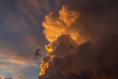 Low angle view of dramatic sky during sunset