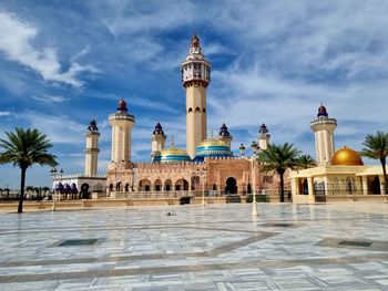 Low angle view of mosque against sky