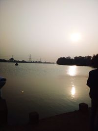 Scenic view of sea against clear sky during sunset