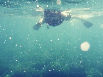 Woman snorkeling in sea