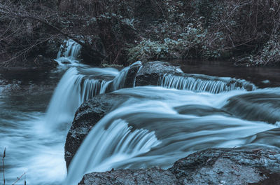 Close-up of waterfall in forest