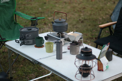 Midsection of woman sitting on table