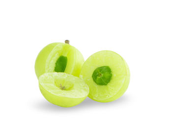 Close-up of fruits against white background