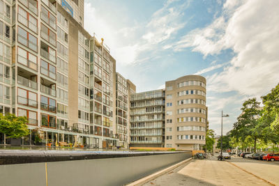 Buildings in city against sky