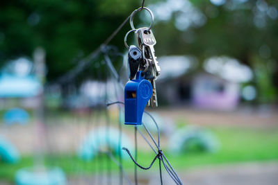 Close-up of keys hanging 