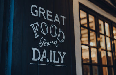 Great food served daily sign outside traditional english pub in stow on the wold, cotswolds, uk,.