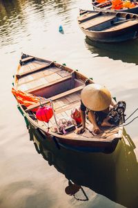 Boat moored in lake