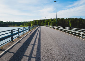 Empty road against sky