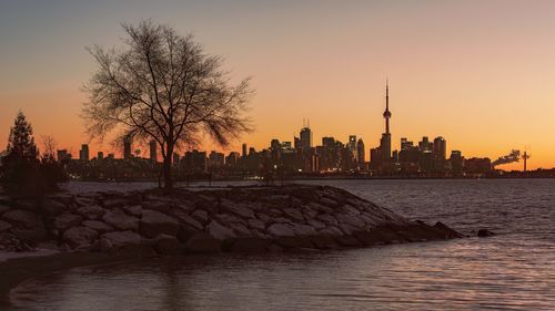 A walk through humber bay park west to view a sunrise across the city of toronto, ontario, canada