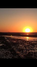 Scenic view of sunset over sea