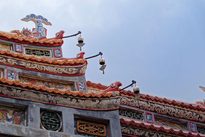 Low angle view of traditional building against sky