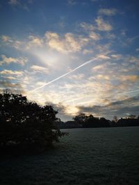 Scenic view of silhouette trees against sky during sunset