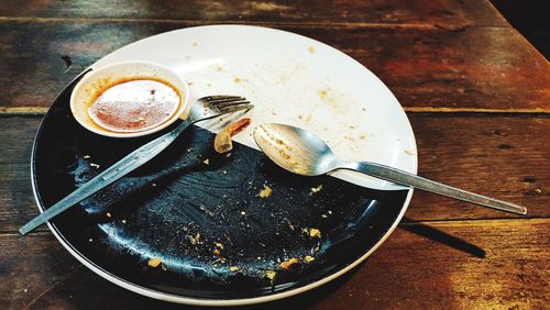 High angle view of coffee cup on table