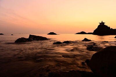 Scenic view of sea against sky during sunset