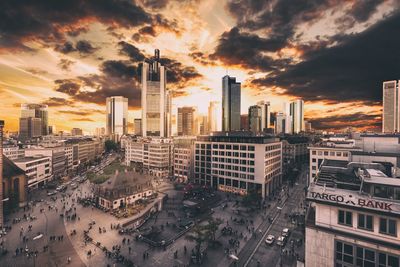 High angle view of buildings against sky during sunset