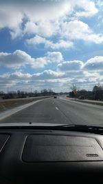 Road passing through car windshield