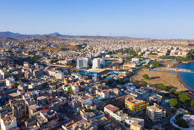 High angle view of townscape against clear blue sky