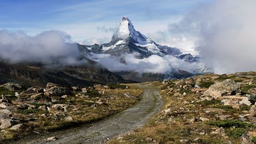 A scenic hike along the trail towards  matterhorn and through the valley in zermatt, switzerland.