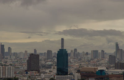 Modern buildings in city against sky