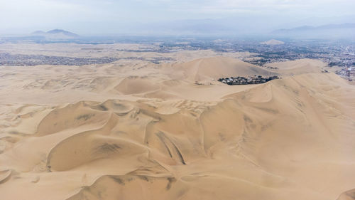 Scenic view of desert against sky