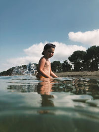  child swimming in the sea