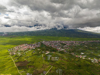 Agricultural land with plantings and tea estate landscape. kayu aro, sumatra, indonesia.