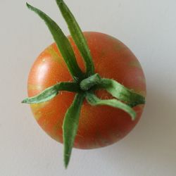 Close-up of oranges over white background