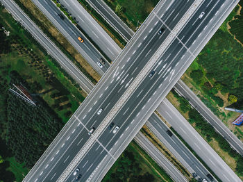 High angle view of road amidst plants in city