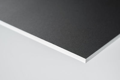 High angle view of paper over white background