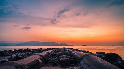 Scenic view of sea against sky during sunset