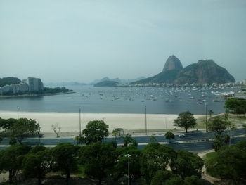 Scenic view of bay against clear sky