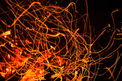 Close-up of illuminated lights at night