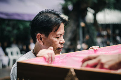Portrait of man looking away