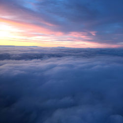 Low angle view of cloudscape against sky during sunset