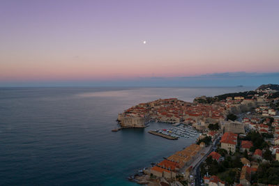 High angle view of sea against sky during sunset