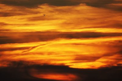 Scenic view of dramatic sky during sunset