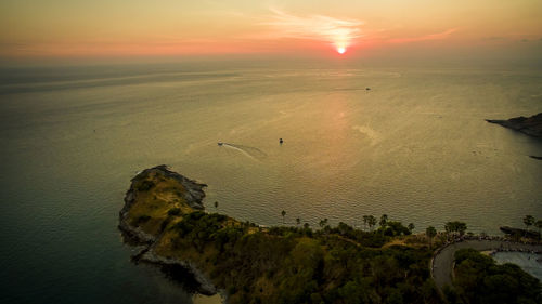 High angle view of sea against sky during sunset