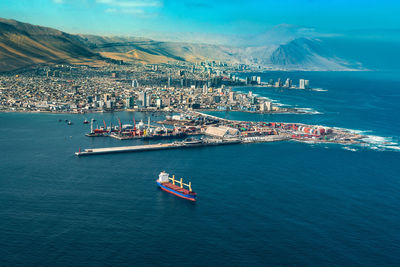 High angle view of harbor by sea against sky