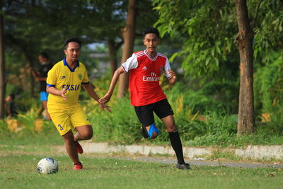 Man running on soccer field