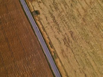 High angle view of road amidst field