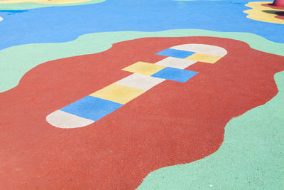 High angle view of arrow symbol on street